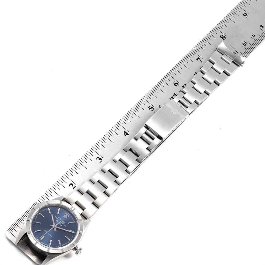 The image shows the Rolex Air-King 14010 Men's Stainless Steel Blue Dial 14010 Men's Stainless Steel Blue Dial watch laid flat with its bracelet and case, aligned along a ruler measuring approximately 8 inches.