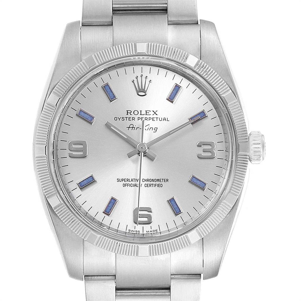 The image shows a front view of a Rolex Air-King 114210 Men's Stainless Steel Silver Dial 114210 Men's Stainless Steel Silver Dial watch, featuring its face, crown, and part of the bracelet.