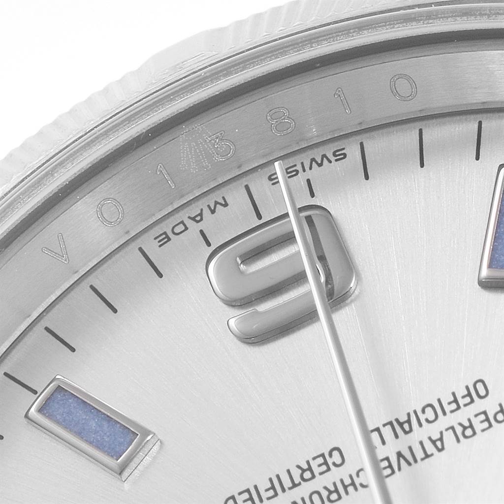 The image shows a close-up of the dial, hour markers, and part of the bezel of the Rolex Air-King 114210 Men's Stainless Steel Silver Dial 114210 Men's Stainless Steel Silver Dial watch.
