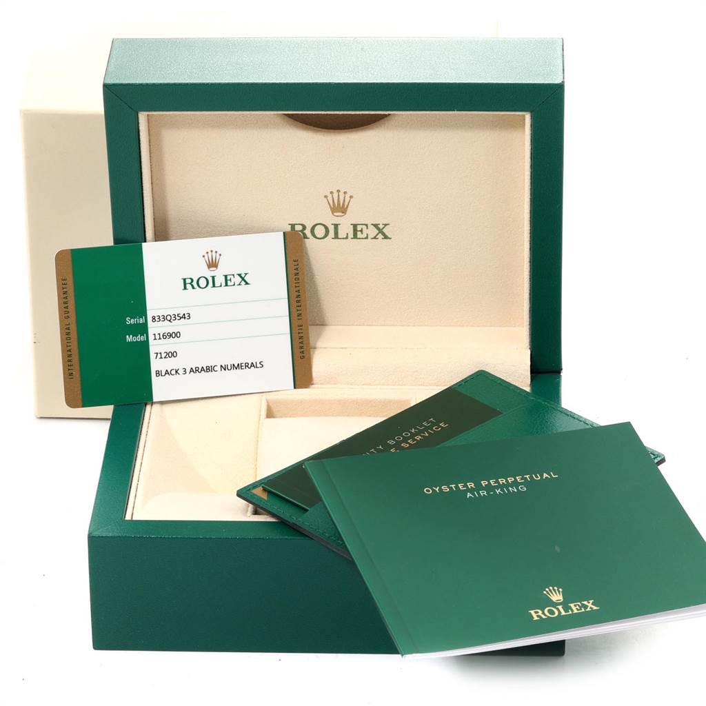 The image shows the packaging, warranty card, and booklets for the Rolex Air-King 116900 Men's Stainless Steel Black Dial 116900 Men's Stainless Steel Black Dial model.