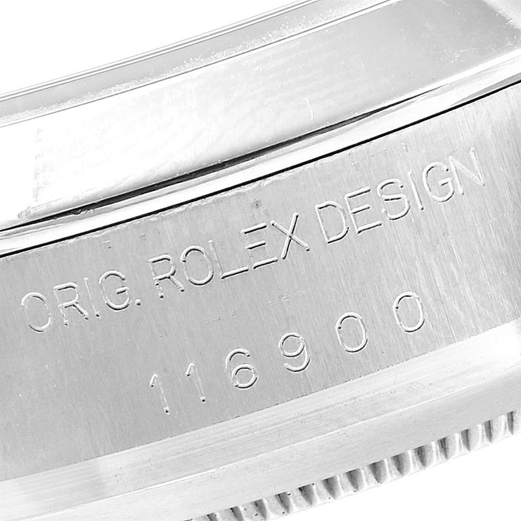 The image shows a close-up of the engraving on the side of a Rolex Air-King 116900 Men's Stainless Steel Black Dial 116900 Men's Stainless Steel Black Dial model, featuring the words "ORIG. ROLEX DESIGN" and the model number "116900".