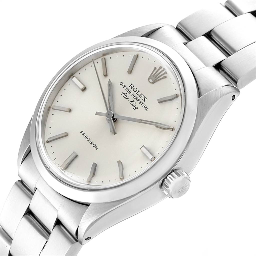 The Rolex Air-King 5500 Men's Stainless Steel Silver Dial 5500 Men's Stainless Steel Silver Dial watch is shown at an angled side view, displaying the dial, case, crown, and stainless steel bracelet.