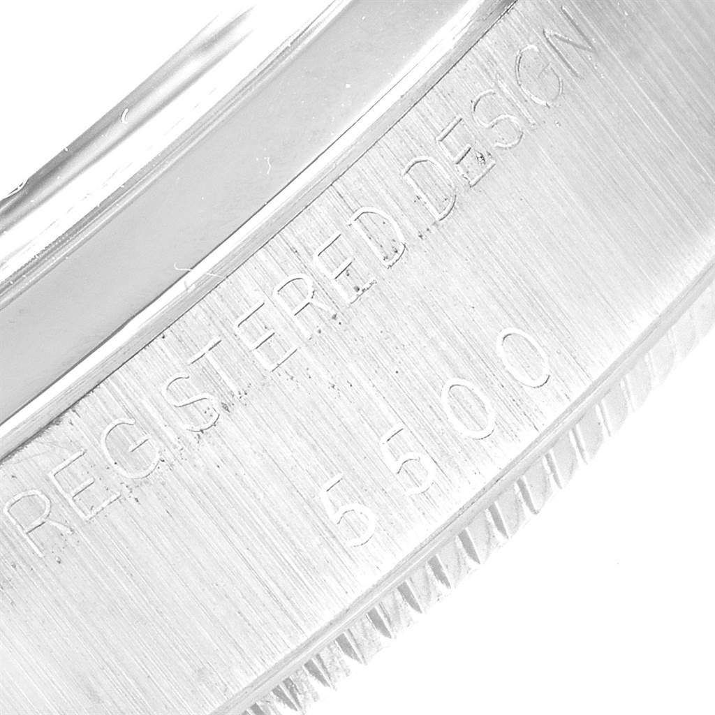 This close-up image shows the engraved bezel of a Rolex Air-King 5500 Men's Stainless Steel Silver Dial 5500 Men's Stainless Steel Silver Dial model, featuring its serial number and design details.