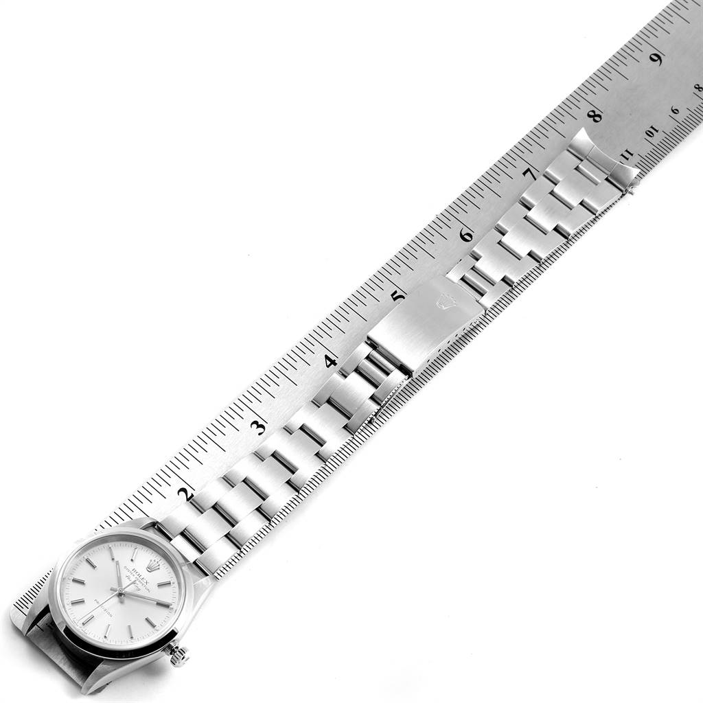This image shows a Rolex Air-King 14000 Men's Stainless Steel Silver Dial 14000 Men's Stainless Steel Silver Dial watch and bracelet flat, measured against a ruler.