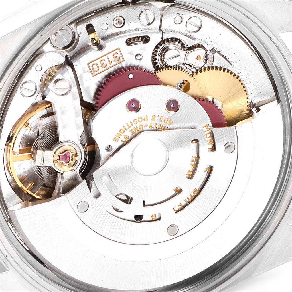 The image shows an angled view of the movement parts inside a Rolex Air-King 14000 Men's Stainless Steel Silver Dial 14000 Men's Stainless Steel Silver Dial watch, specifically its intricate mechanical components.