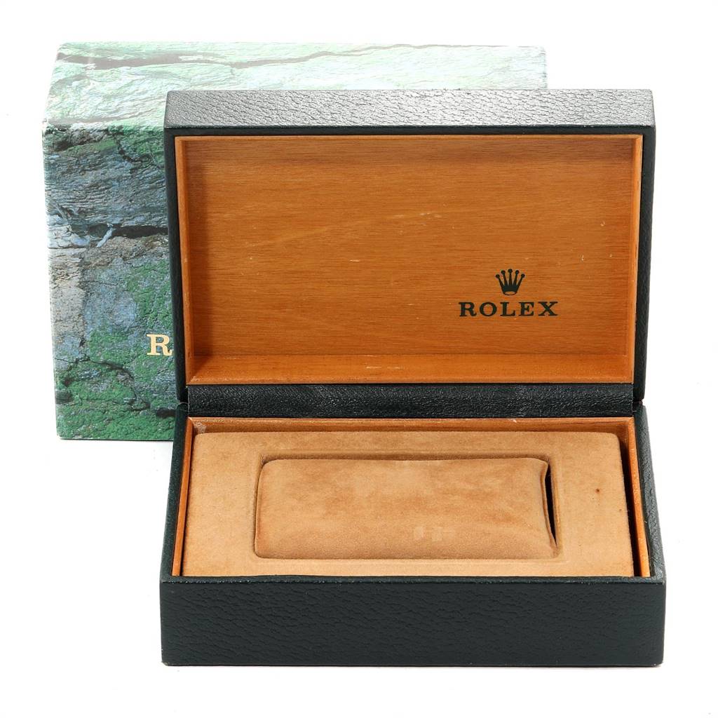 This image shows an open Rolex Air-King 14000 Men's Stainless Steel Silver Dial 14000 Men's Stainless Steel Silver Dial watch box, revealing the padded watch holder inside.
