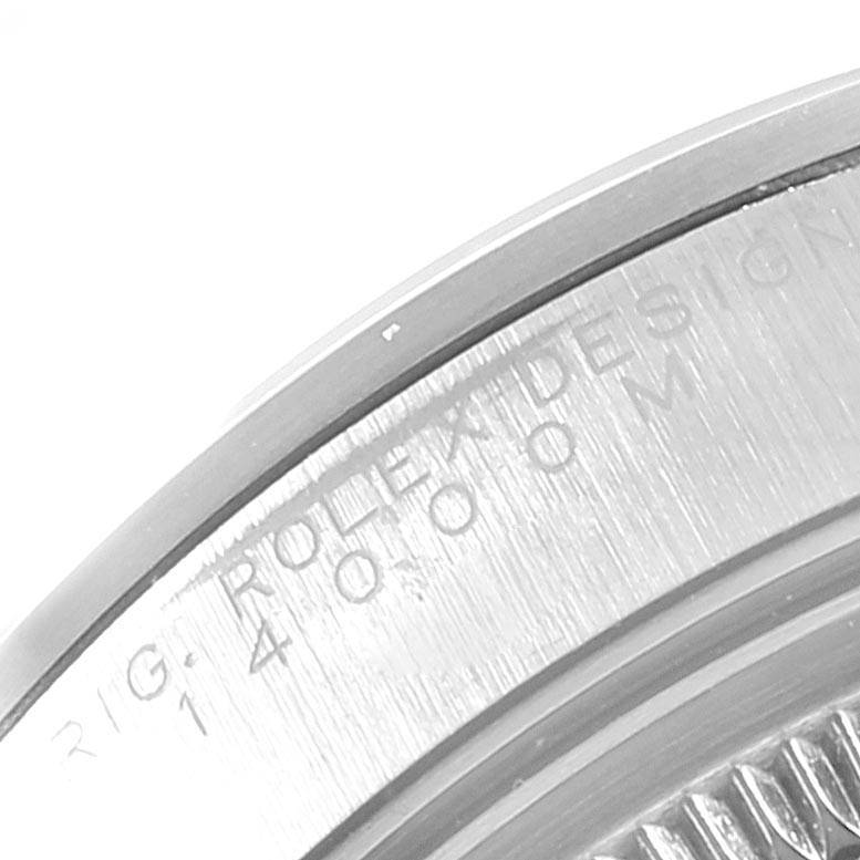 This image shows a close-up of the bezel and part of the case back of a Rolex Air-King 14000 Men's Stainless Steel Pink Dial 14000 Men's Stainless Steel Pink Dial watch.