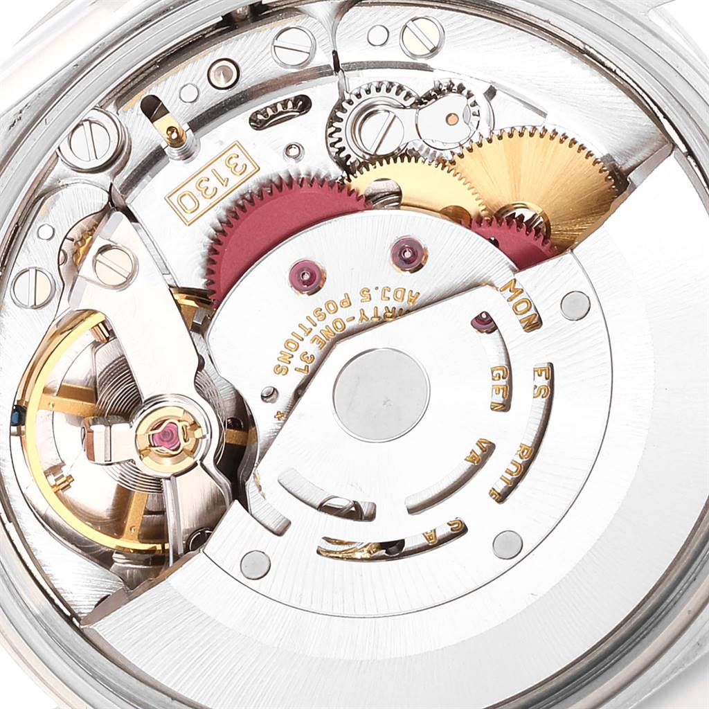 This image shows a close-up view of the internal mechanism of a Rolex Air-King 14000 Men's Stainless Steel Pink Dial 14000 Men's Stainless Steel Pink Dial watch, featuring gears and the rotor assembly.