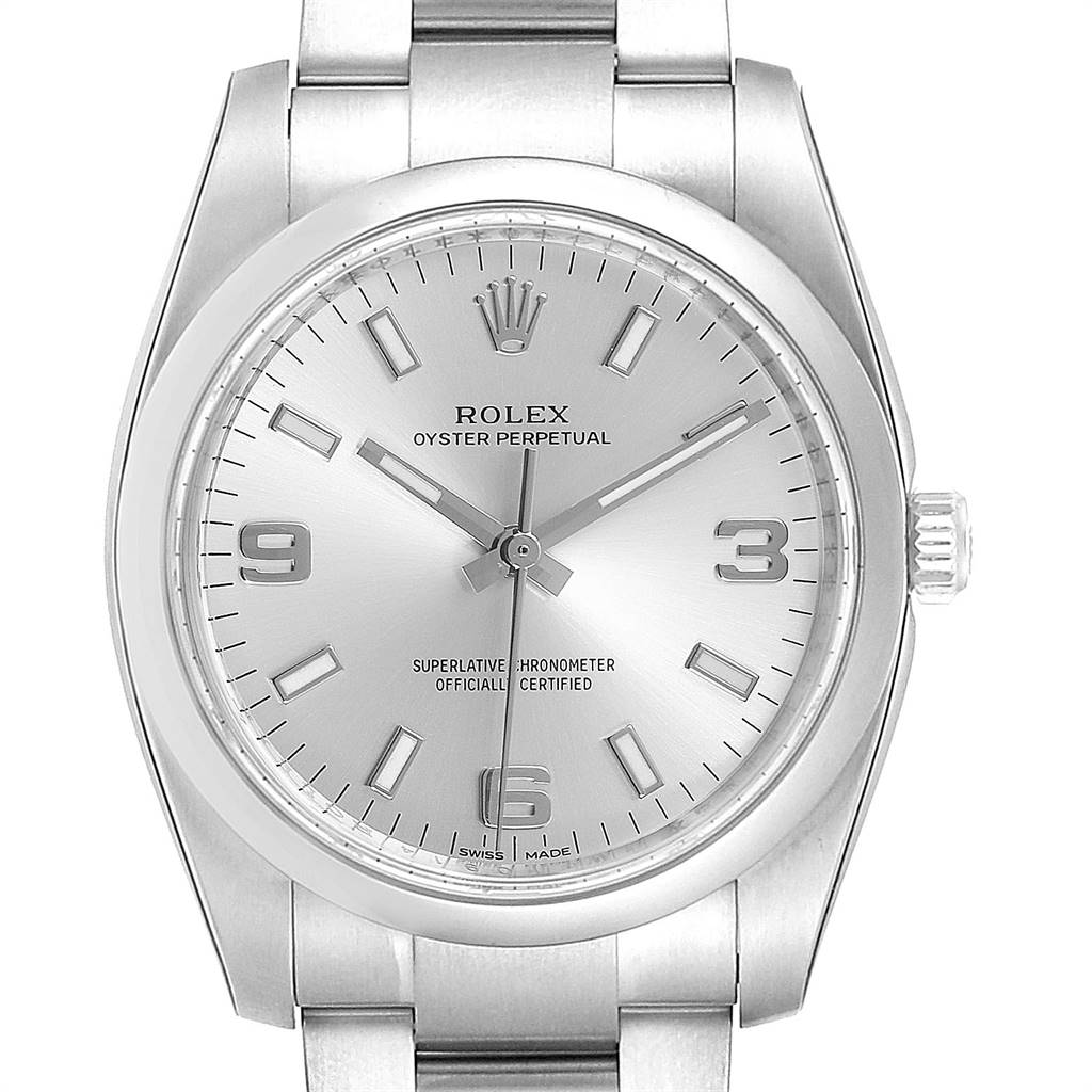 The image shows a front view of the Rolex Oyster Perpetual 114200 Men's Stainless Steel Silver Dial 114200 Men's Stainless Steel Silver Dial watch, displaying the dial, hands, crown, and part of the bracelet.