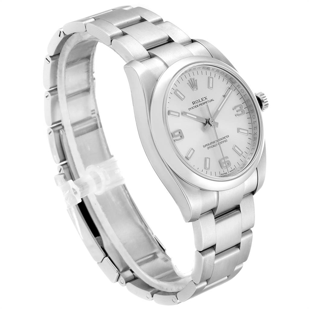 The image shows a side view of the Rolex Oyster Perpetual 114200 Men's Stainless Steel Silver Dial 114200 Men's Stainless Steel Silver Dial watch, displaying its face, case, and bracelet.