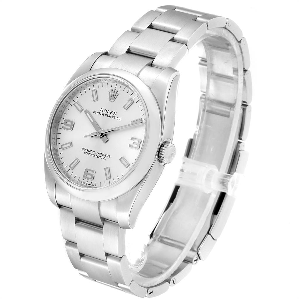This image displays a Rolex Oyster Perpetual 114200 Men's Stainless Steel Silver Dial 114200 Men's Stainless Steel Silver Dial watch from a three-quarter view, highlighting its face, bezel, crown, and bracelet.