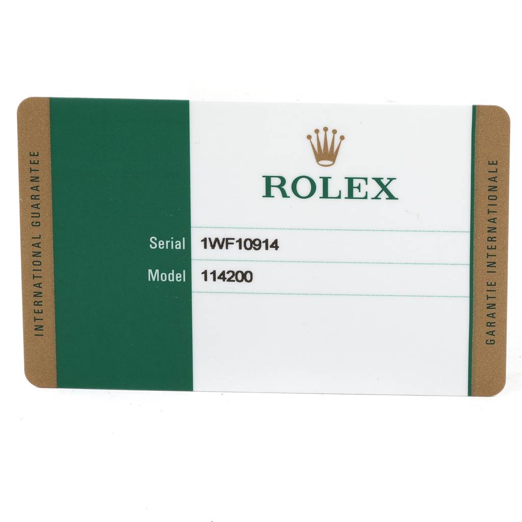 The image shows an International Guarantee card for a Rolex Oyster Perpetual 114200 Men's Stainless Steel Silver Dial 114200 Men's Stainless Steel Silver Dial model number 114200.