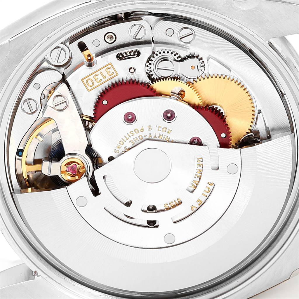 This image shows the internal movement mechanism of the Rolex Oyster Perpetual 114200 Men's Stainless Steel Silver Dial 114200 Men's Stainless Steel Silver Dial, viewed from the back.