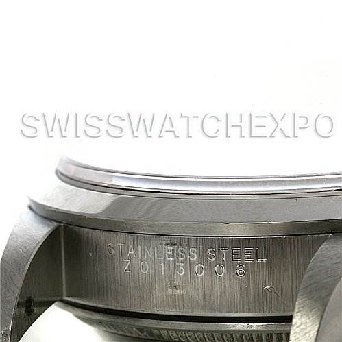 The image shows a close-up side view of the stainless steel case and serial number of a Rolex Air-King 14000M Men's Stainless Steel Silver Dial 14000M Men's Stainless Steel Silver Dial watch.