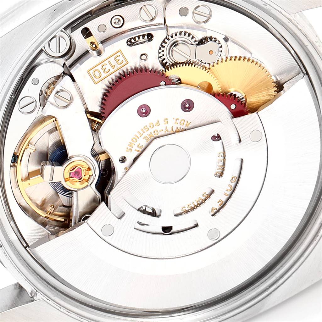 The image shows the intricate movement and internal components of a Rolex Air-King 114200 Men's Stainless Steel Blue Dial 114200 Men's Stainless Steel Blue Dial watch from a close-up angle.