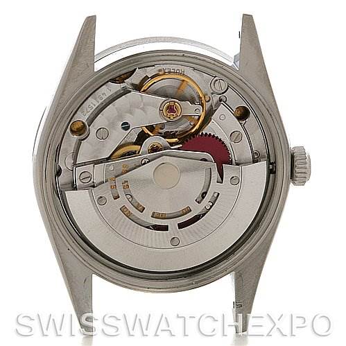This image shows the back view of a Rolex Air-King 14010 Men's Stainless Steel White Dial 14010 Men's Stainless Steel White Dial watch, revealing its internal mechanical movement.