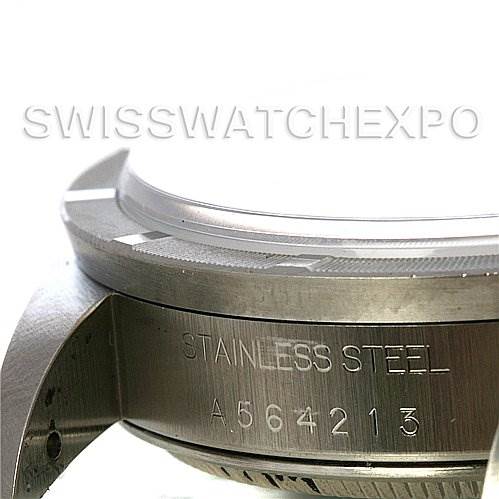 The image shows a close-up angle of the stainless steel case and serial number of the Rolex Air-King 14010 Men's Stainless Steel White Dial 14010 Men's Stainless Steel White Dial watch.