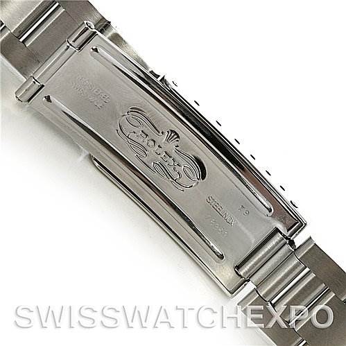 This image shows the inner clasp of a Rolex Air-King 14010 Men's Stainless Steel White Dial 14010 Men's Stainless Steel White Dial watch, displaying the brand's logo and details at a close-up angle.