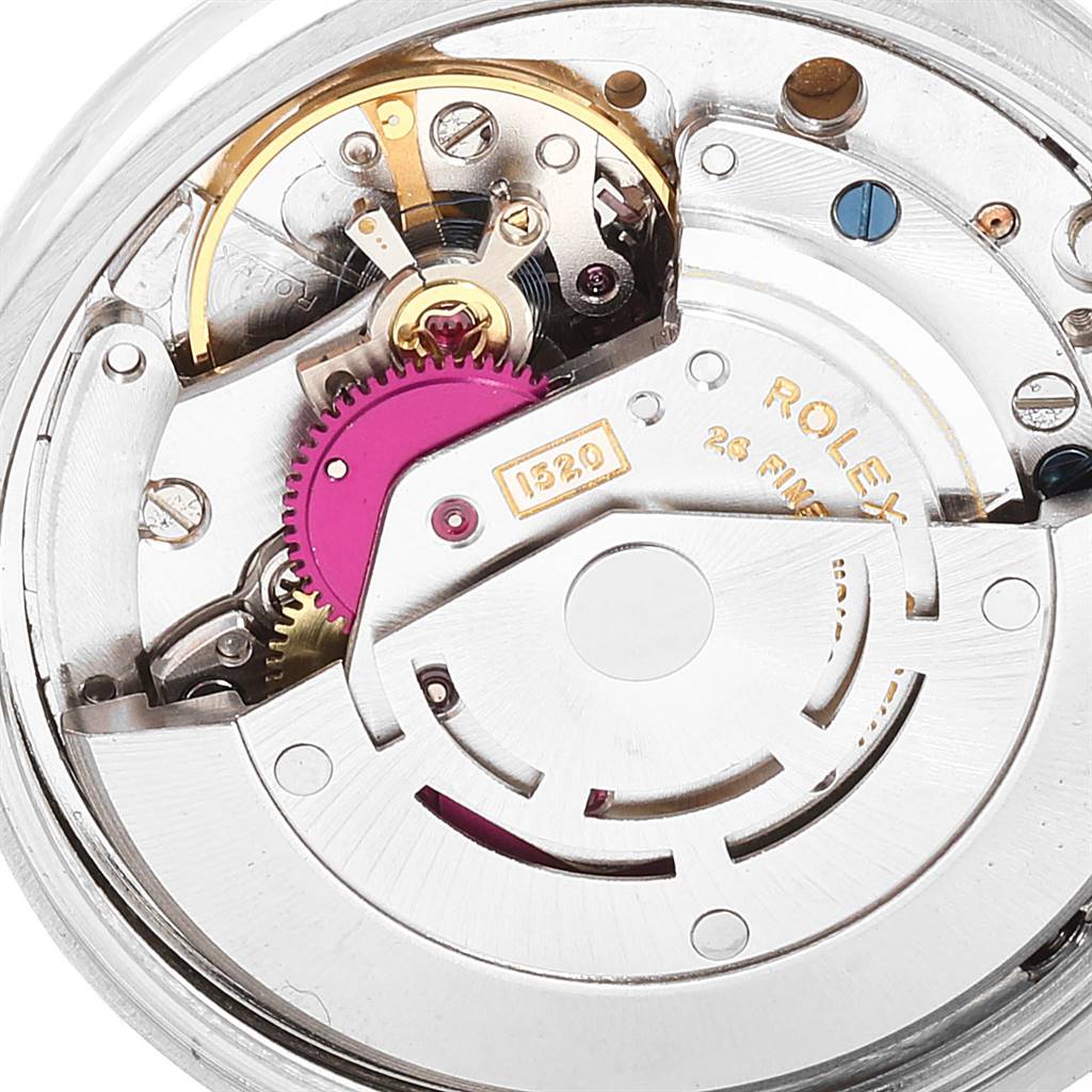 This image shows the movement mechanism of a Rolex Air-King 5500 Men's Stainless Steel Silver Dial 5500 Men's Stainless Steel Silver Dial watch, highlighting the internal gears and components.