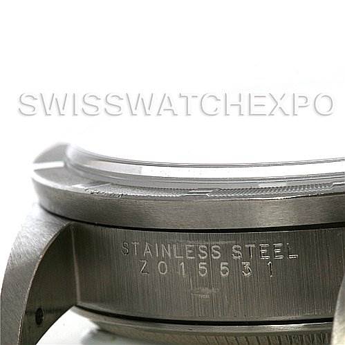 The image shows a close-up view of the stainless steel case and serial number of a Rolex Air-King 14010 Men's Stainless Steel Silver Dial 14010 Men's Stainless Steel Silver Dial watch.