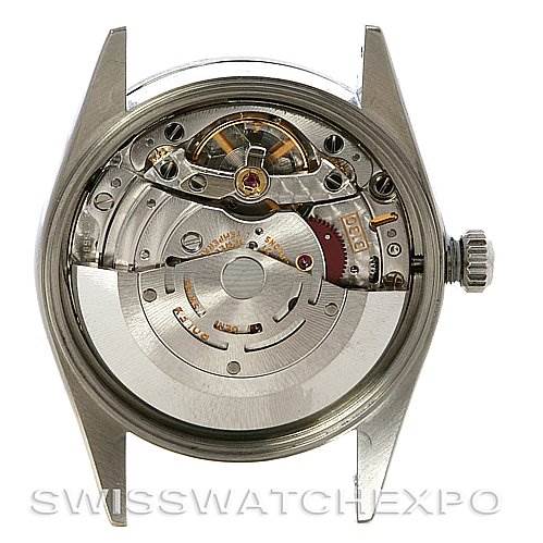 This image shows the open back of a Rolex Air-King 14010 Men's Stainless Steel Pink Dial 14010 Men's Stainless Steel Pink Dial watch, revealing its internal mechanical movement.