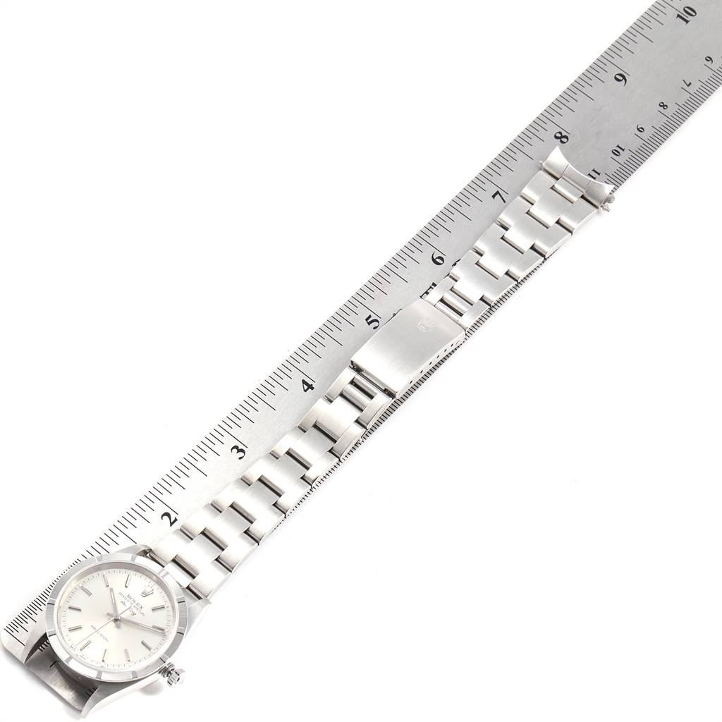 The image shows a Rolex Air-King 14010 Men's Stainless Steel Silver Dial 14010 Men's Stainless Steel Silver Dial watch lying flat with a metal bracelet, measured by a ruler alongside it.
