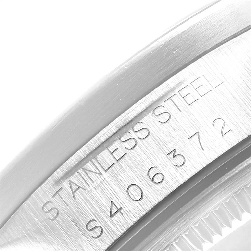 This close-up image shows the stainless steel case back and model/serial number of the Rolex Air-King 14010 Men's Stainless Steel Blue Dial 14010 Men's Stainless Steel Blue Dial watch.