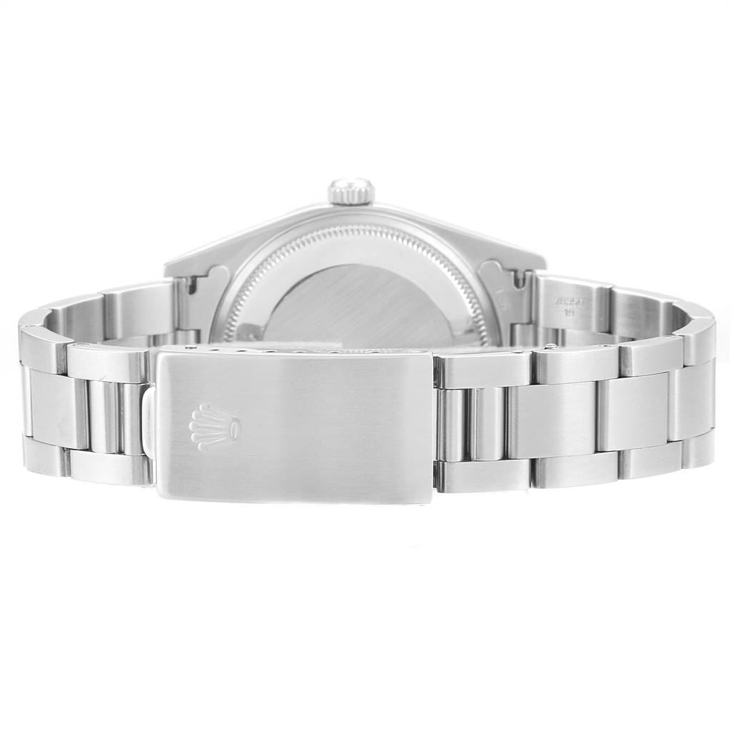 This image shows the back side of a Rolex Air-King 14010 Men's Stainless Steel Blue Dial 14010 Men's Stainless Steel Blue Dial model watch, including the case back and bracelet clasp.