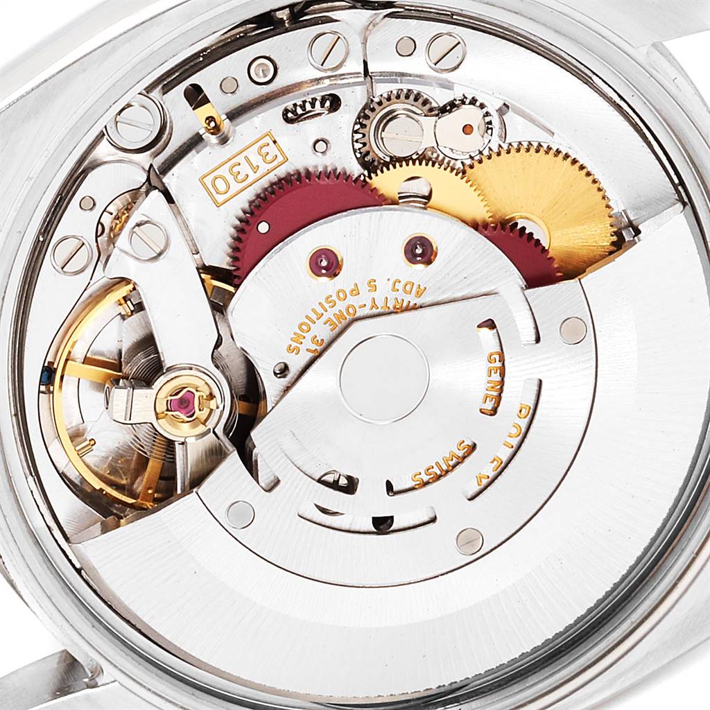 This image shows a close-up of the movement inside a Rolex Air-King 114210 Men's Stainless Steel Grey Dial 114210 Men's Stainless Steel Grey Dial watch, highlighting gears and components.