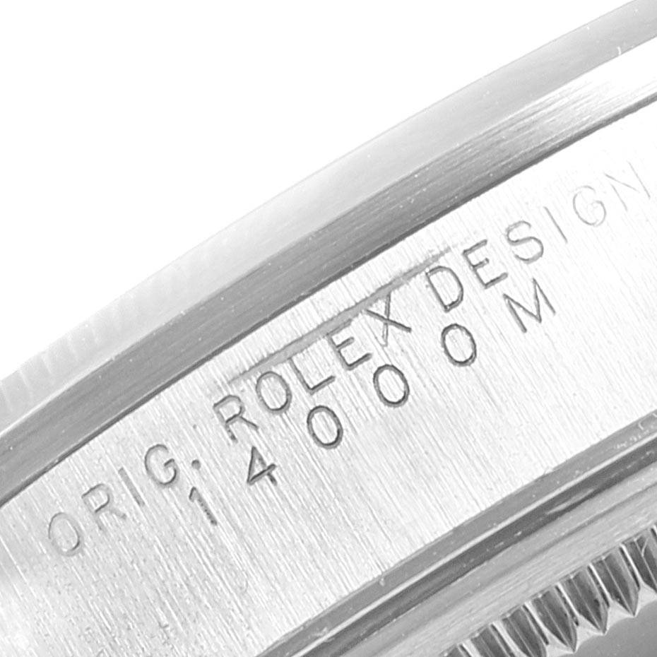 The image shows a close-up of the side engraving on the bezel of a Rolex Air-King 14000 Men's Stainless Steel Blue Dial 14000 Men's Stainless Steel Blue Dial watch.