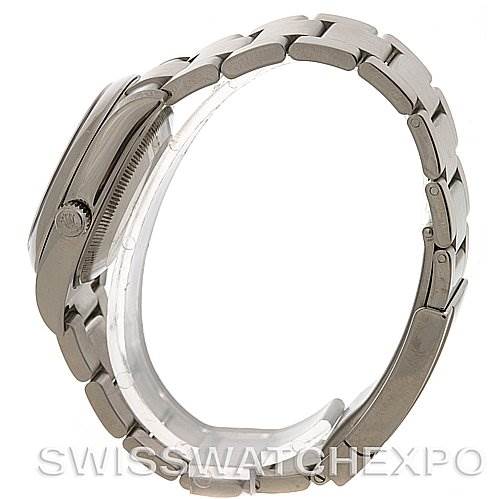 This side view of the Rolex Air-King 114200 Men's Stainless Steel Silver Dial 114200 Men's Stainless Steel Silver Dial watch shows the metal bracelet and crown but not the face.