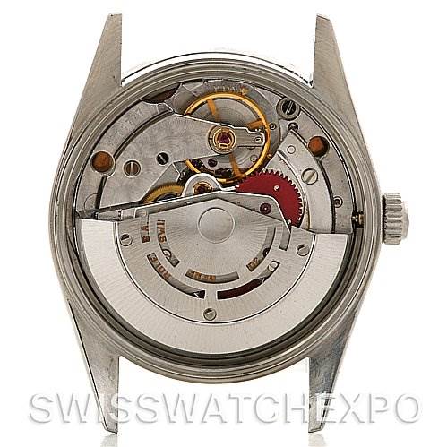 This image shows the back view of a Rolex Air-King 14010 Men's Stainless Steel Pink Dial 14010 Men's Stainless Steel Pink Dial watch, revealing its internal mechanics and movement.