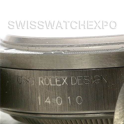 This close-up image shows the engraved caseback of a Rolex Air-King 14010 Men's Stainless Steel Pink Dial 14010 Men's Stainless Steel Pink Dial model with the serial number and "ORIG. ROLEX DESIGN" inscription.