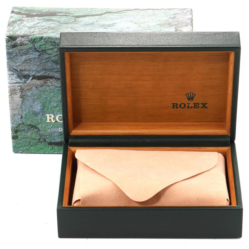 The image shows an open Rolex Air-King 14000 Men's Stainless Steel Silver Dial 14000 Men's Stainless Steel Silver Dial watch box with an envelope inside, showcasing the interior and exterior design.