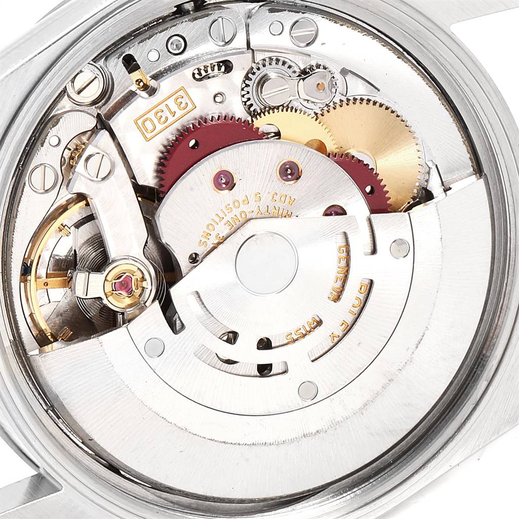 This image shows the movement mechanism of a Rolex Air-King 14000 Men's Stainless Steel Silver Dial 14000 Men's Stainless Steel Silver Dial watch with gears and other internal components visible.