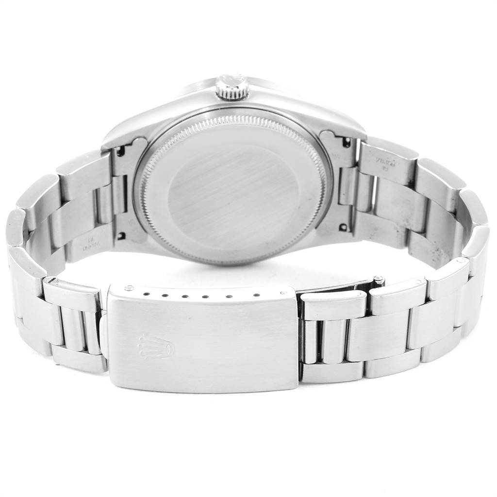 The image shows the back view of a Rolex Air-King 14010 Men's Stainless Steel White Dial 14010 Men's Stainless Steel White Dial watch, highlighting its case back, bracelet, and clasp.