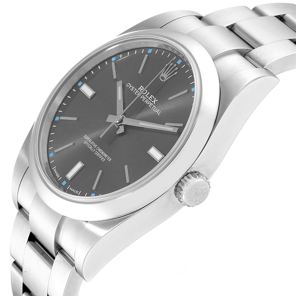 The image shows a side view of the Rolex Oyster Perpetual 114300 Men's Stainless Steel Silver Dial 114300 Men's Stainless Steel Silver Dial watch, highlighting the face, bezel, crown, and part of the bracelet.