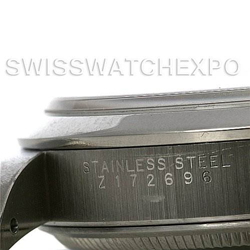 This image shows a close-up, side-angle view of a Rolex Air-King 14000M Men's Stainless Steel Silver Dial 14000M Men's Stainless Steel Silver Dial, focusing on the stainless steel case and serial number.
