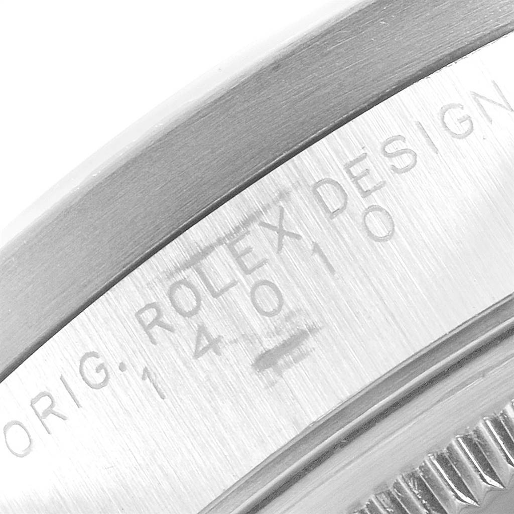 This image shows a close-up of the side, focusing on the engraved bezel of the Rolex Air-King 14010 Men's Stainless Steel Black Dial 14010 Men's Stainless Steel Black Dial watch.