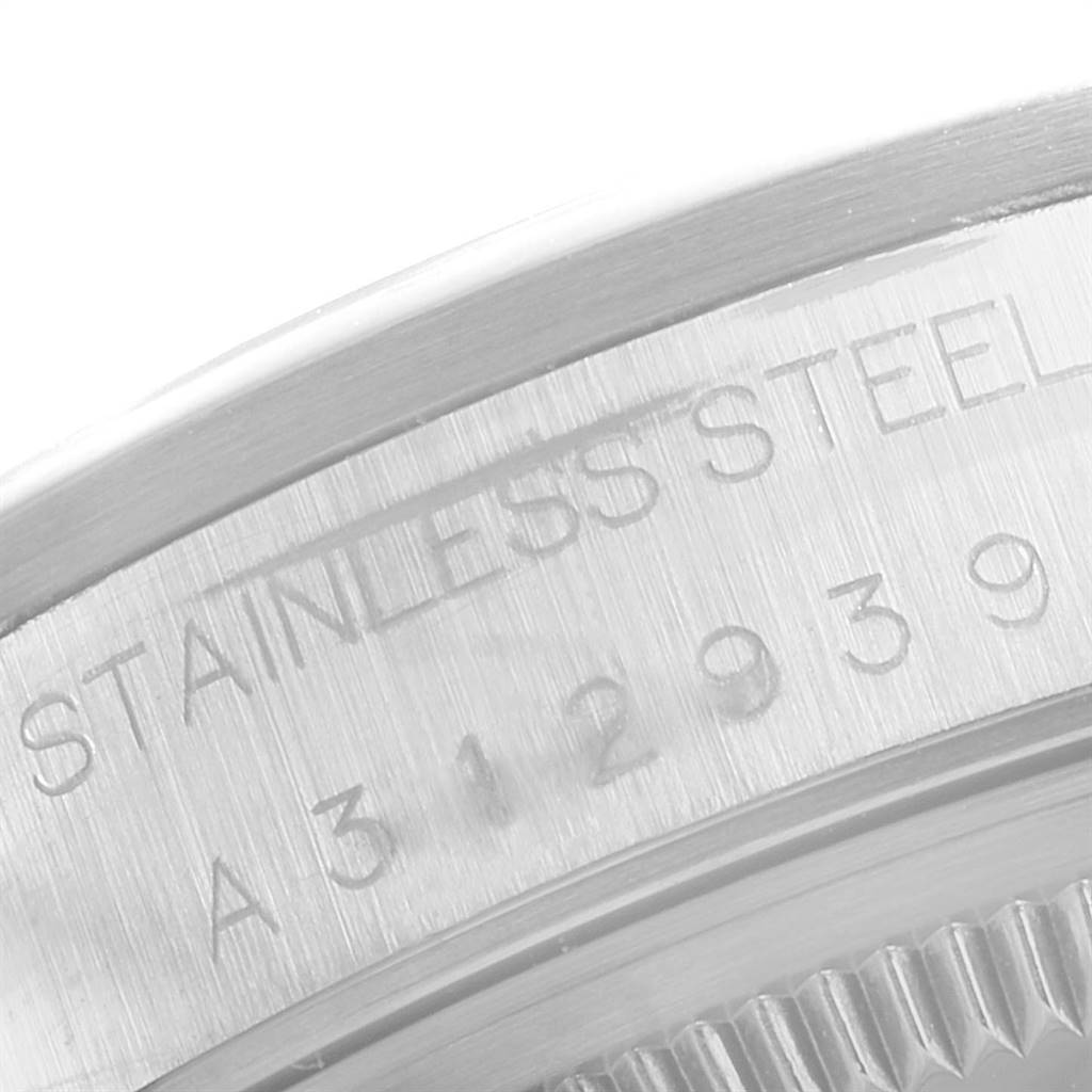 This image shows a close-up of the stainless steel case back with inscription and serial number of a Rolex Air-King 14000 Men's Stainless Steel Black Dial 14000 Men's Stainless Steel Black Dial watch.
