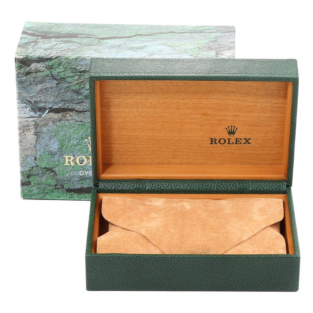 The image shows an open Rolex Air-King 14000 Men's Stainless Steel Black Dial 14000 Men's Stainless Steel Black Dial watch box with a green exterior, wooden interior, and pouch.