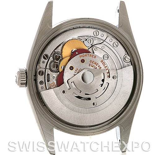 The image shows the back view of a Rolex Air-King 14000M Men's Stainless Steel Blue Dial 14000M Men's Stainless Steel Blue Dial watch, revealing its internal mechanical movement.