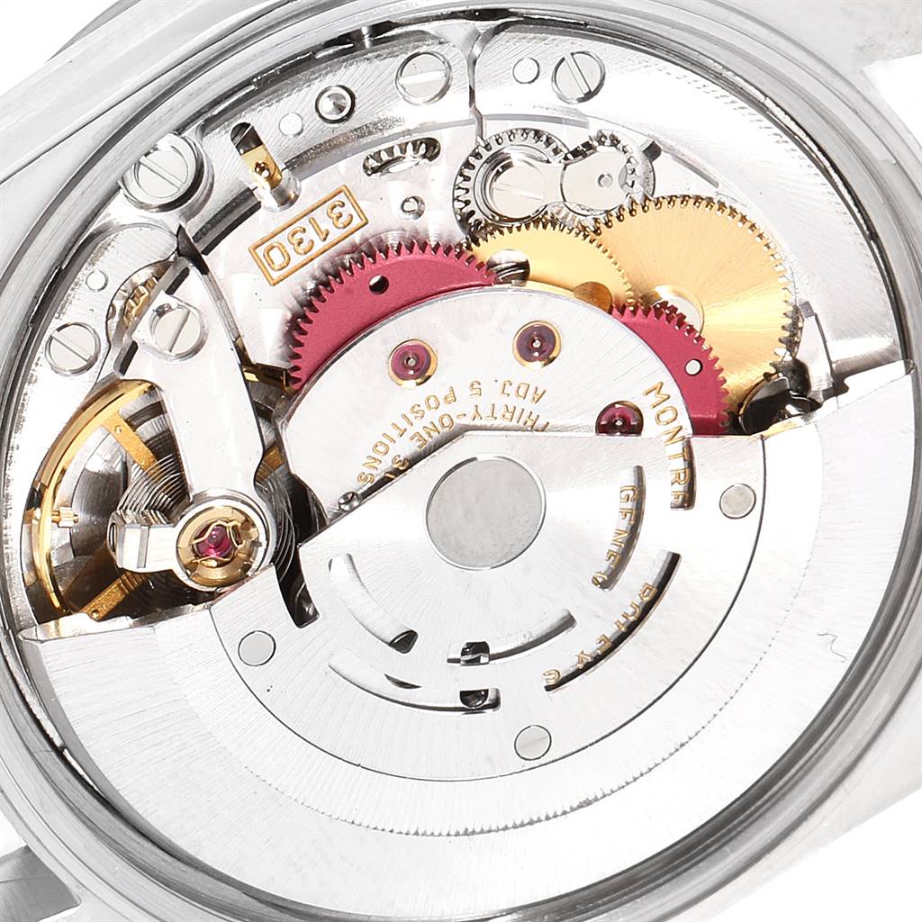 The image shows the internal mechanics and movement of the Rolex Air-King 14000 Men's Stainless Steel Blue Dial 14000 Men's Stainless Steel Blue Dial watch from an angled side view.