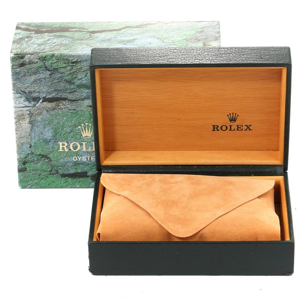 The image shows the open box and packaging of a Rolex Air-King 14000 Men's Stainless Steel Blue Dial 14000 Men's Stainless Steel Blue Dial watch, displaying the inner wood and exterior green marble-like design.