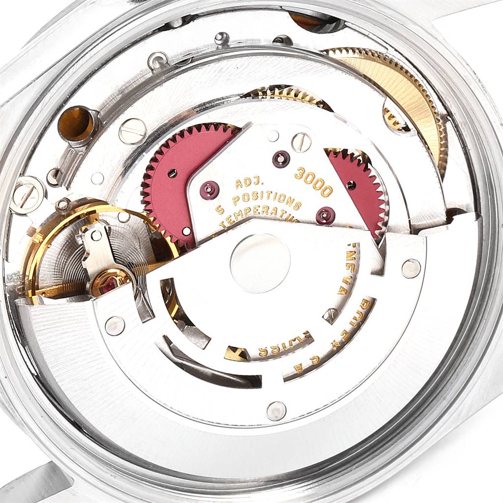 This image shows the detailed internal mechanism of a Rolex Air-King 14000 Men's Stainless Steel Blue Dial 14000 Men's Stainless Steel Blue Dial watch from a rear perspective, highlighting gears and components.