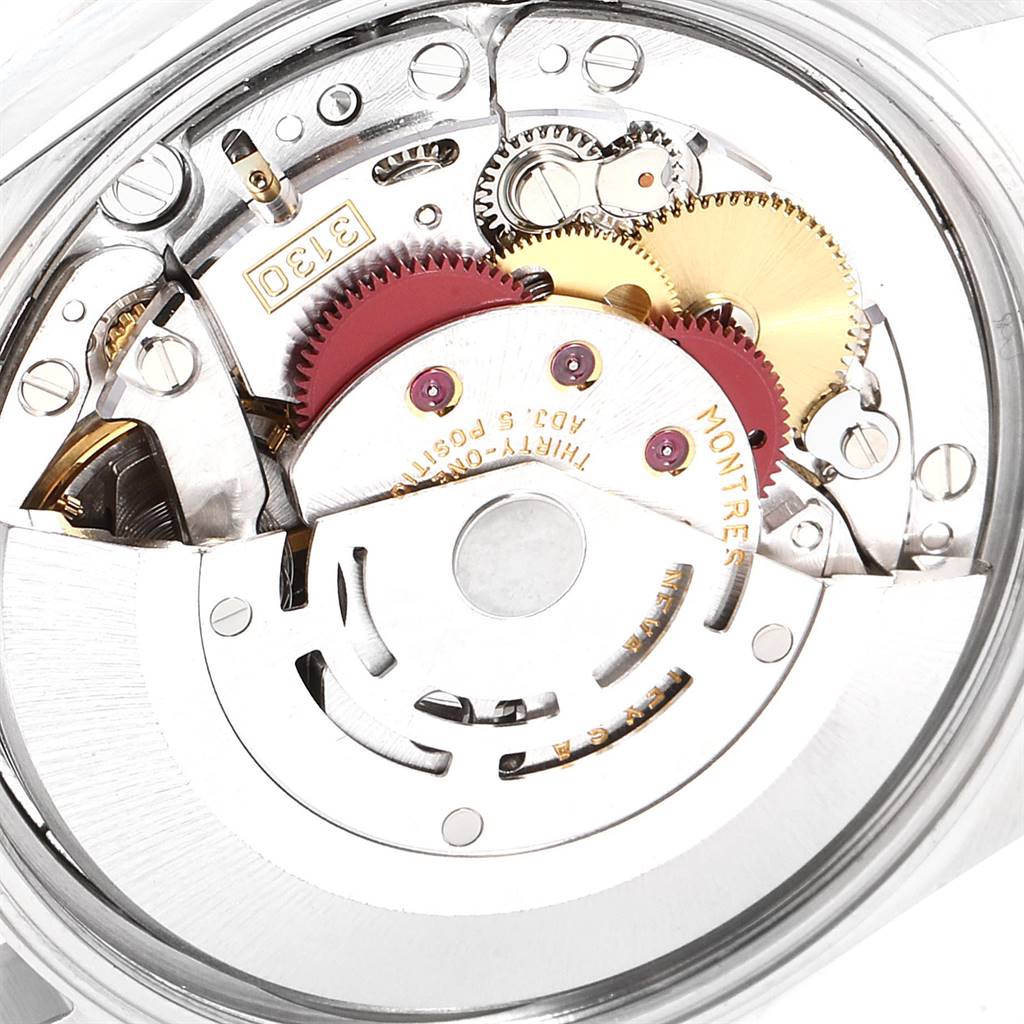 This is a detailed close-up of the internal mechanism of a Rolex Air-King 14000 Men's Stainless Steel Silver Dial 14000 Men's Stainless Steel Silver Dial watch, showcasing gears and intricate components.
