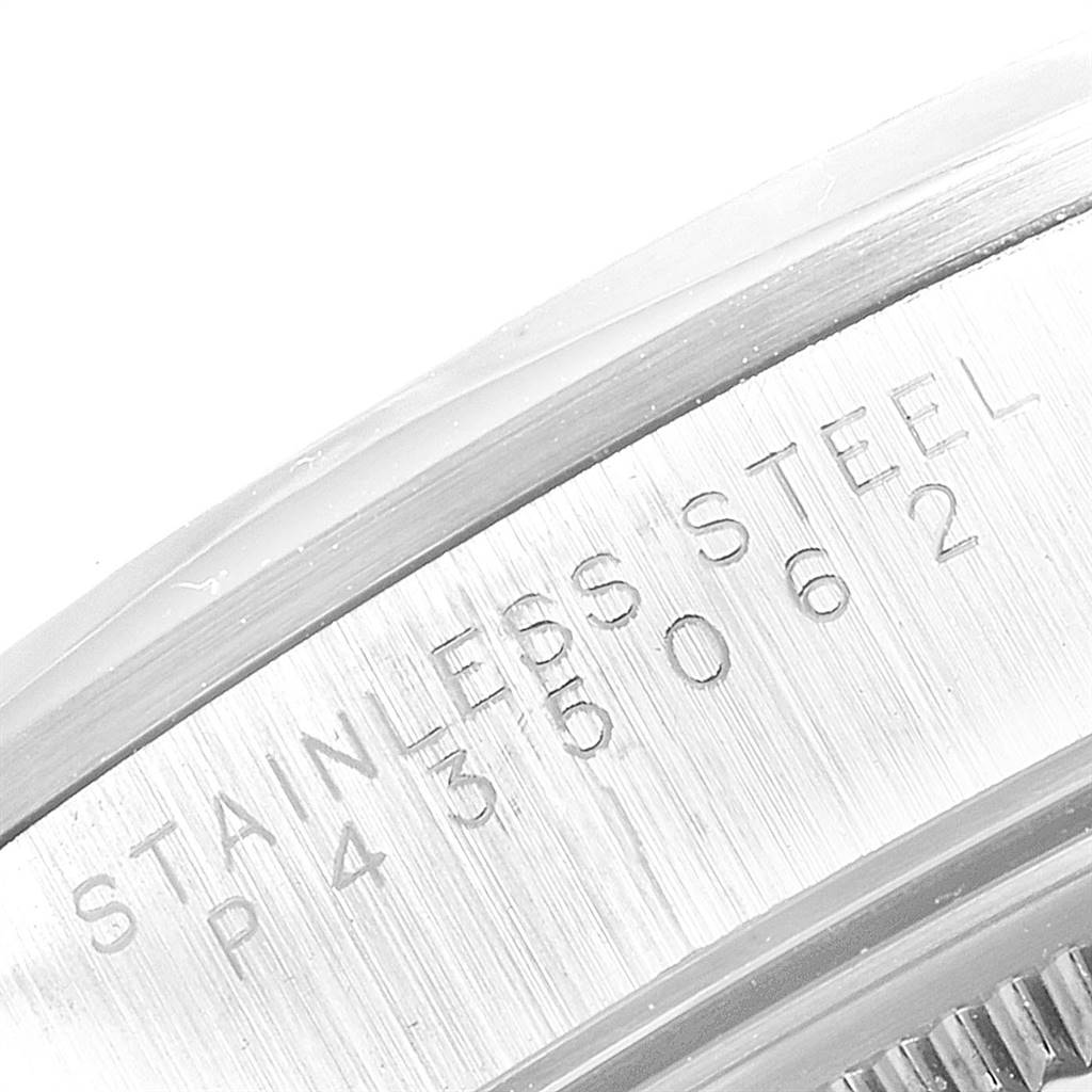 The image shows a close-up of the case back edge with engraved text "STAINLESS STEEL" for the Rolex Air-King 14000 Men's Stainless Steel Silver Dial 14000 Men's Stainless Steel Silver Dial watch.
