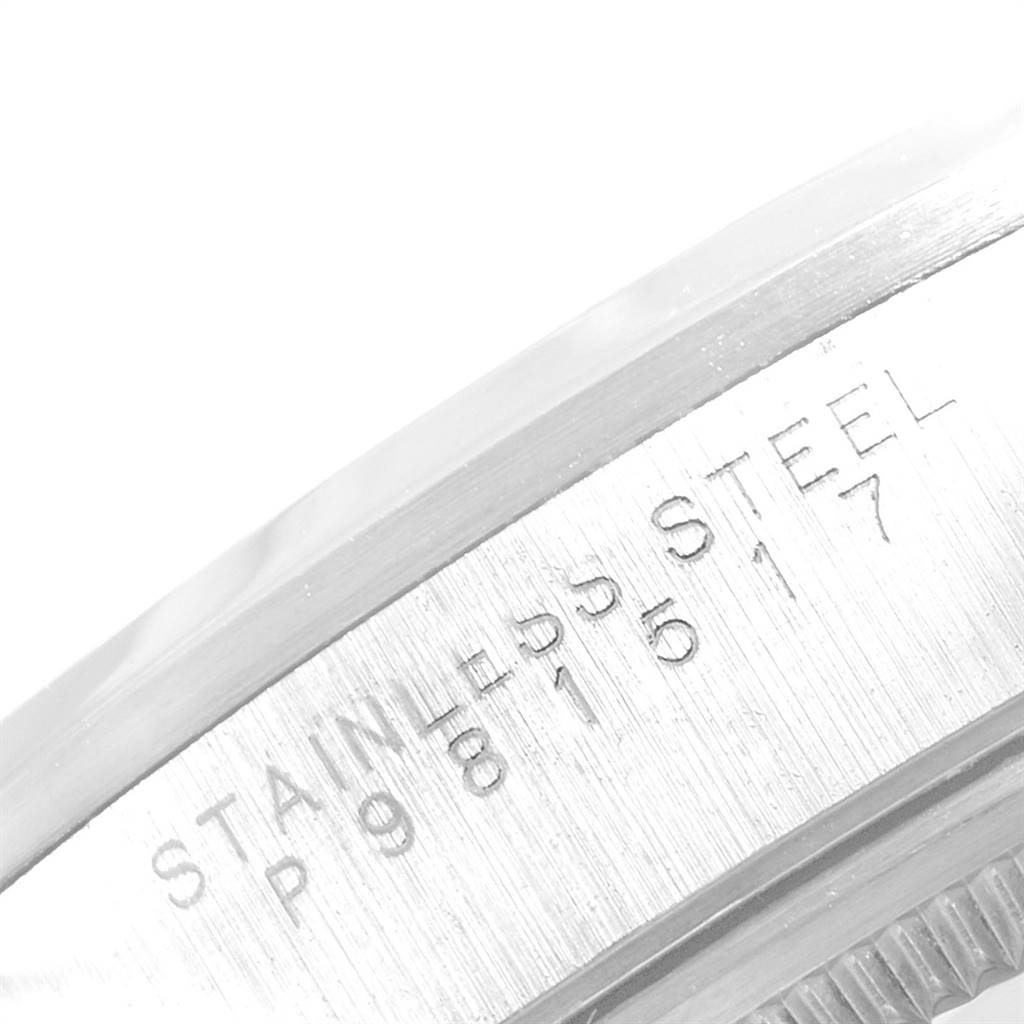 This close-up image shows the serial number and "Stainless Steel" inscription on the side of a Rolex Air-King 14000 Men's Stainless Steel Silver Dial 14000 Men's Stainless Steel Silver Dial watch case.