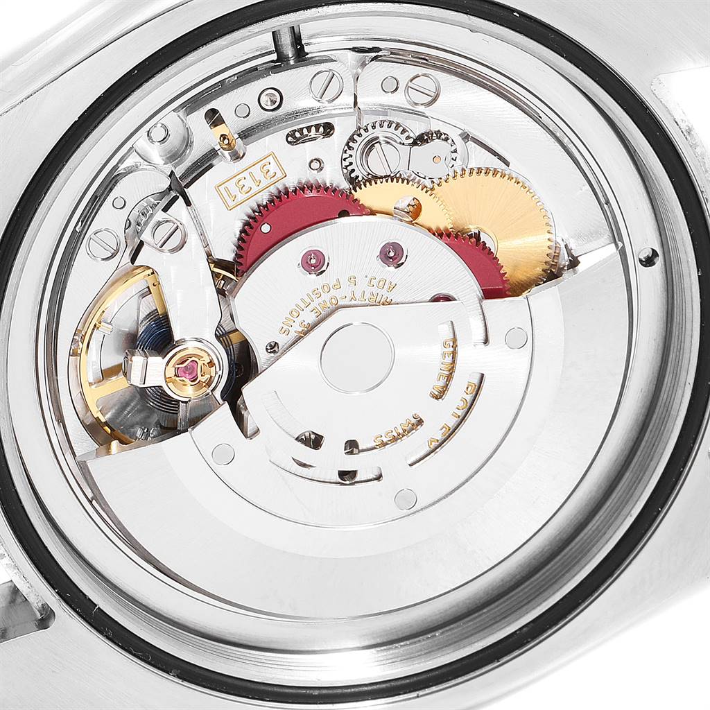 This is a close-up view of the internal movement mechanism of a Rolex Air-King 116900 Men's Stainless Steel Black Dial 116900 Men's Stainless Steel Black Dial watch, showcasing gears and components.