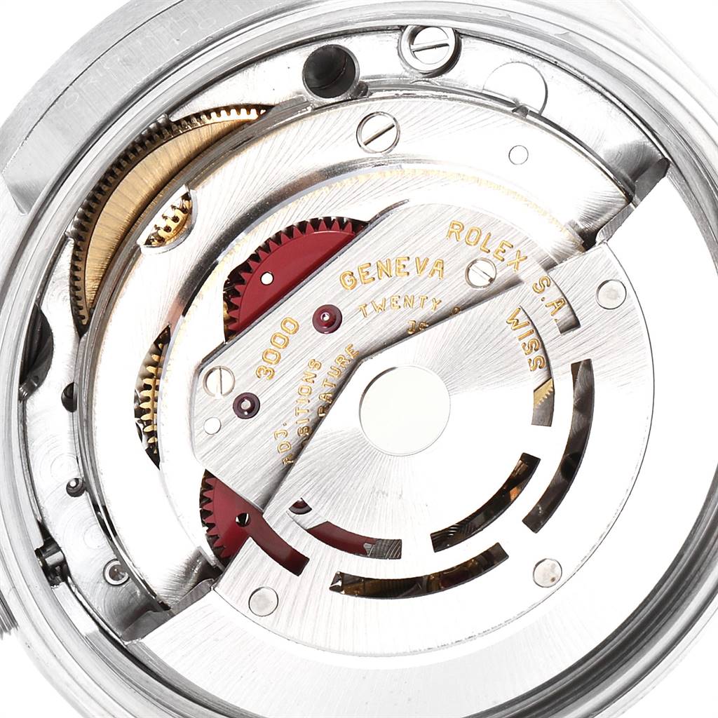 This image shows a close-up of the movement mechanism of a Rolex Air-King 14010 Men's Stainless Steel Grey Dial 14010 Men's Stainless Steel Grey Dial watch, highlighting its intricate internal components.